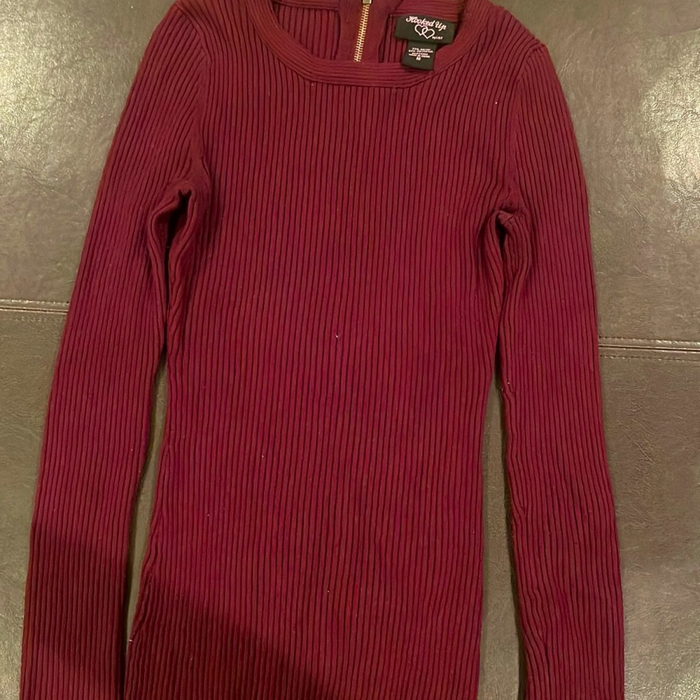 A burgundy/ wine color comfortable sweater